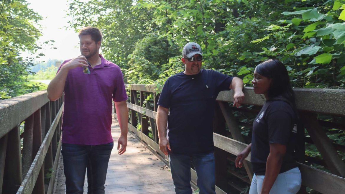 Longtime employees at Lake City Army Ammunition Plant and Machinists Union members are protesting proposed budget cuts that could threaten their jobs. From left to right: Scott Brown, Ryan Waddell and Diana Dierking.