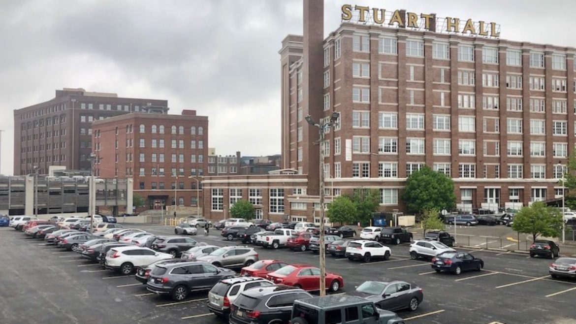 The Tracks apartment project will be built on this parking lot next to the historic Freight House building.