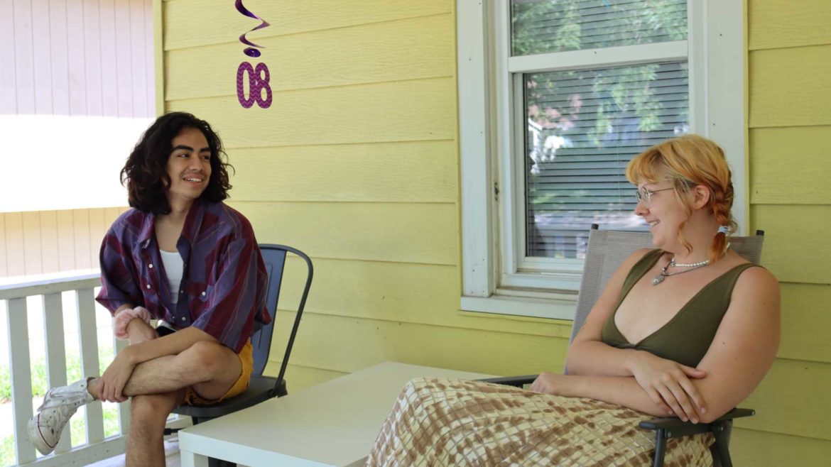Fabian Rosales (left) and roommate Emma Hopkins hope to return to their rental house in Lawrence after the repairs to their plumbing are finished.