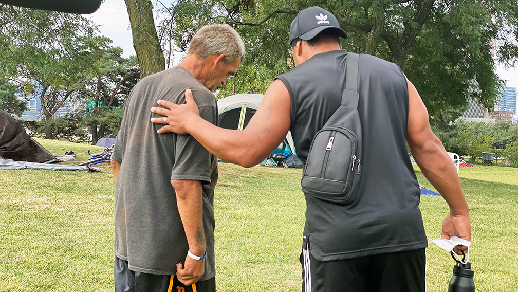 Anton Washington, who leads the Houseless Task Force, helped folks get situated at an encampment on 11th Street and Harrison Ave.