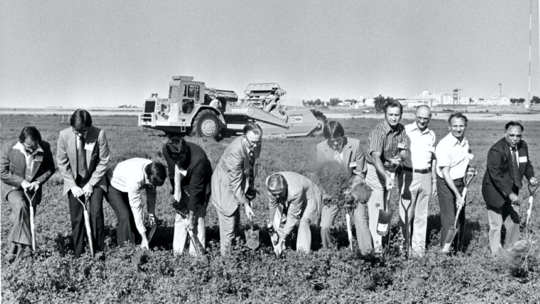 Local government officials and meatpacking executives shovel dirt at the groundbreaking of the meatpacking plant just outside Garden City in 1979.
