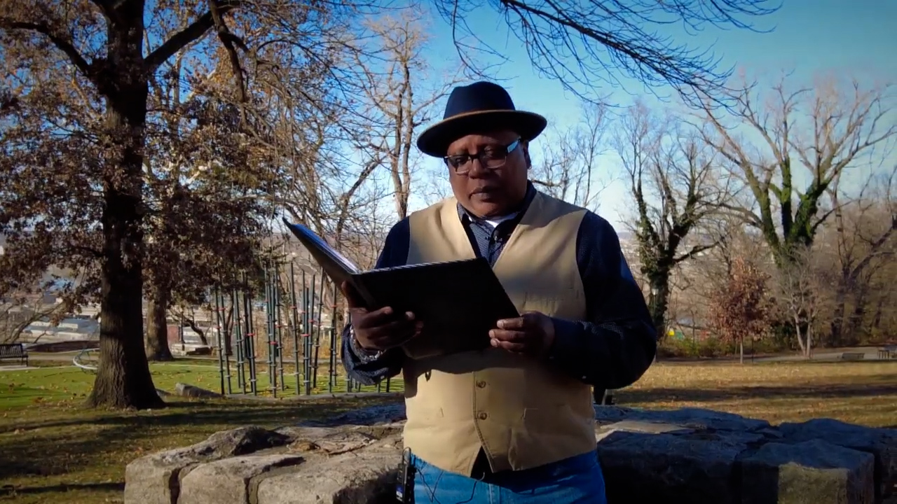 Glenn North recites "I Sing Their Names" as part of KC Performs.