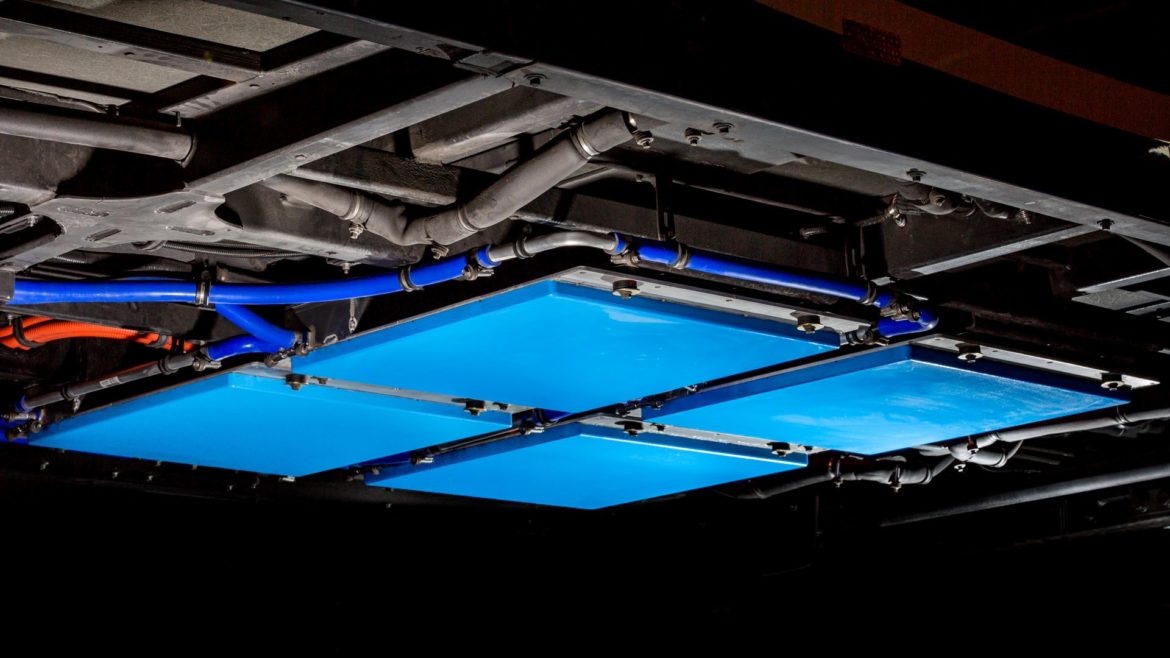 A blue plate bolted to the underside of EV buses at Kansas City International Airport will help push sustainability at the airport -- and potentially across the area.