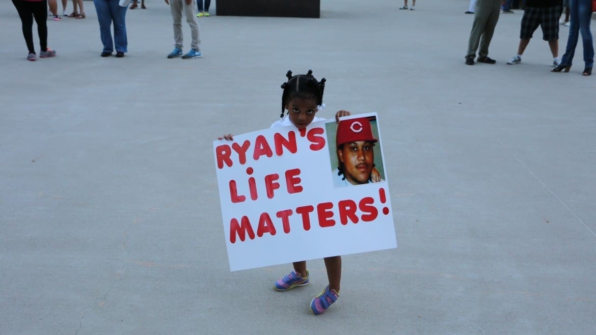 Neriha Stokes, the daughter of Ryan Stokes, participated in a vigil for her late father Friday, July 24. Ryan Stokes was shot by an KC police officer on July 28, 2013.