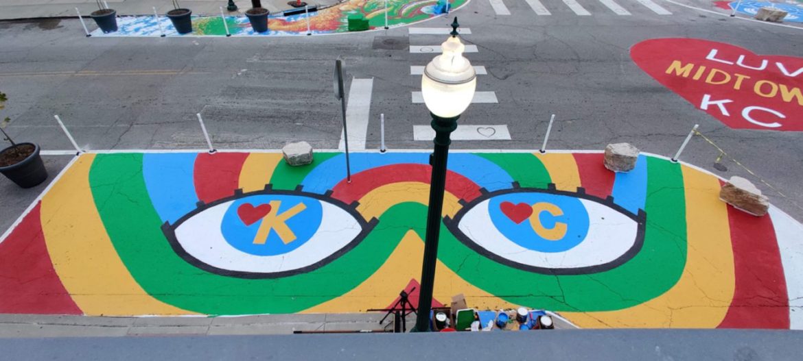 Aerial view of the “Eye Heart KC” mural by recent Kansas City Art Institute alumni Parker Story, at the intersection of Westport Road and Wyandotte Street, created as part of the first round of commissions under the Asphalt Art Initiative program.