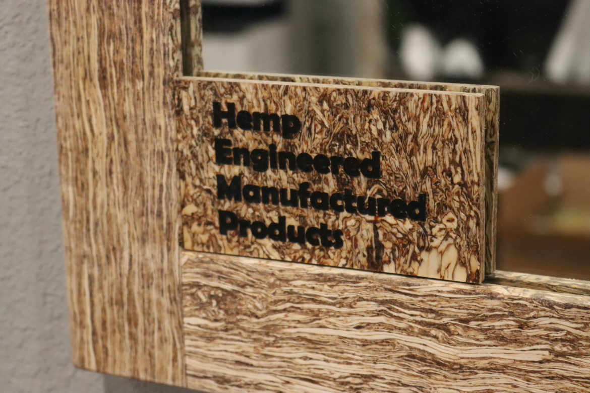 Sign on a mirror reads: hemp engineered manufactured products