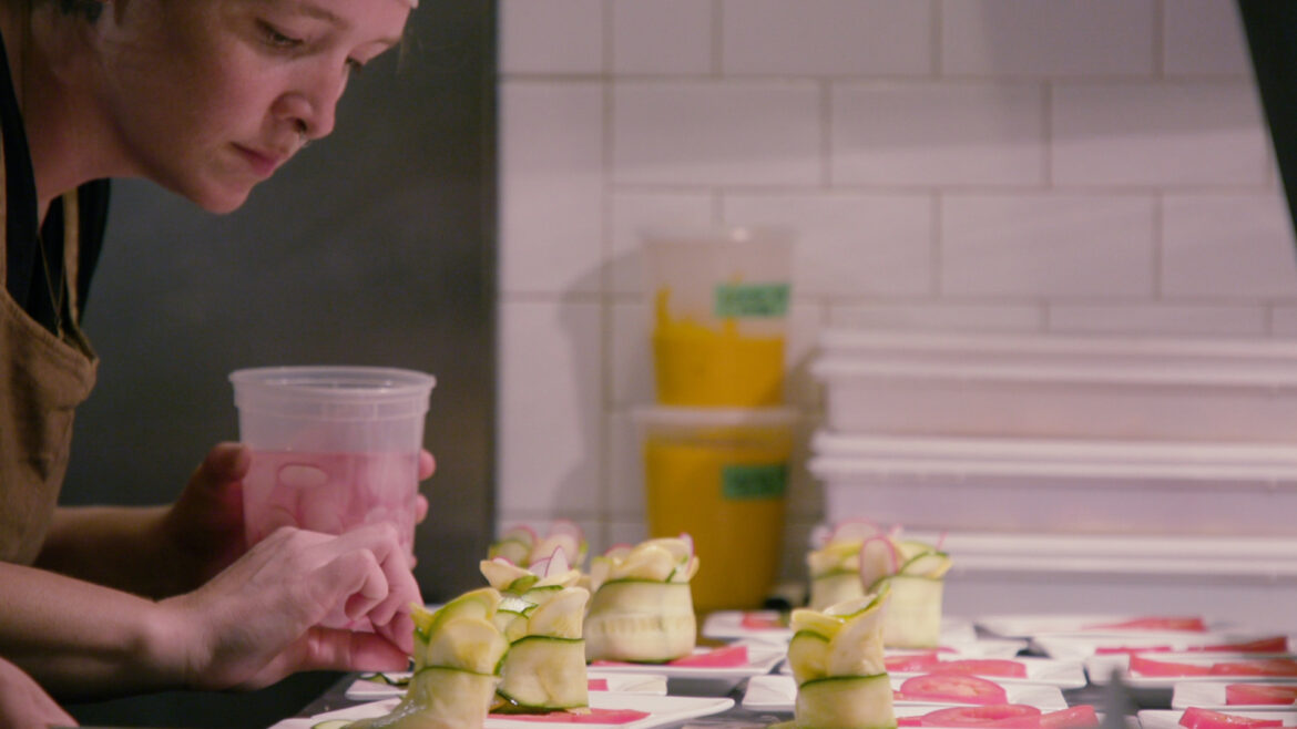 Chef Sara Osborn prepares a meal.