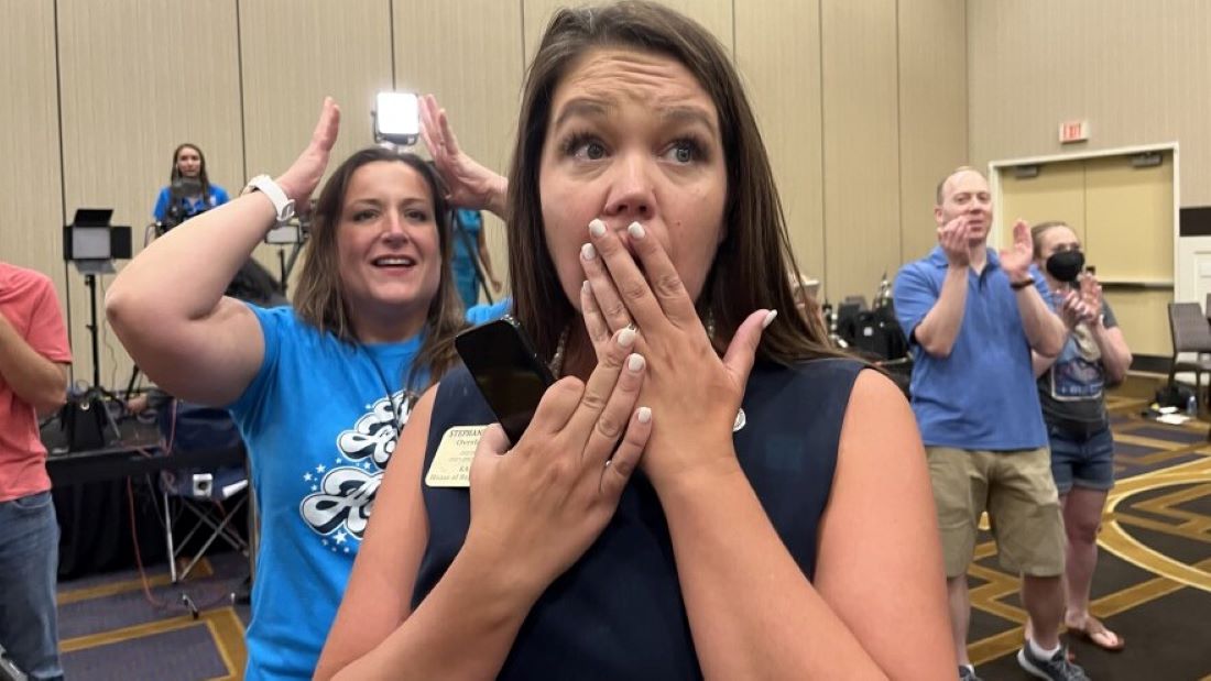 Kansas state Rep. Stephanie Clayton, an abortion rights supporter who was a Republican and is now a Democrat, reacts as a referendum to strip abortion rights out of the state constitution fails.