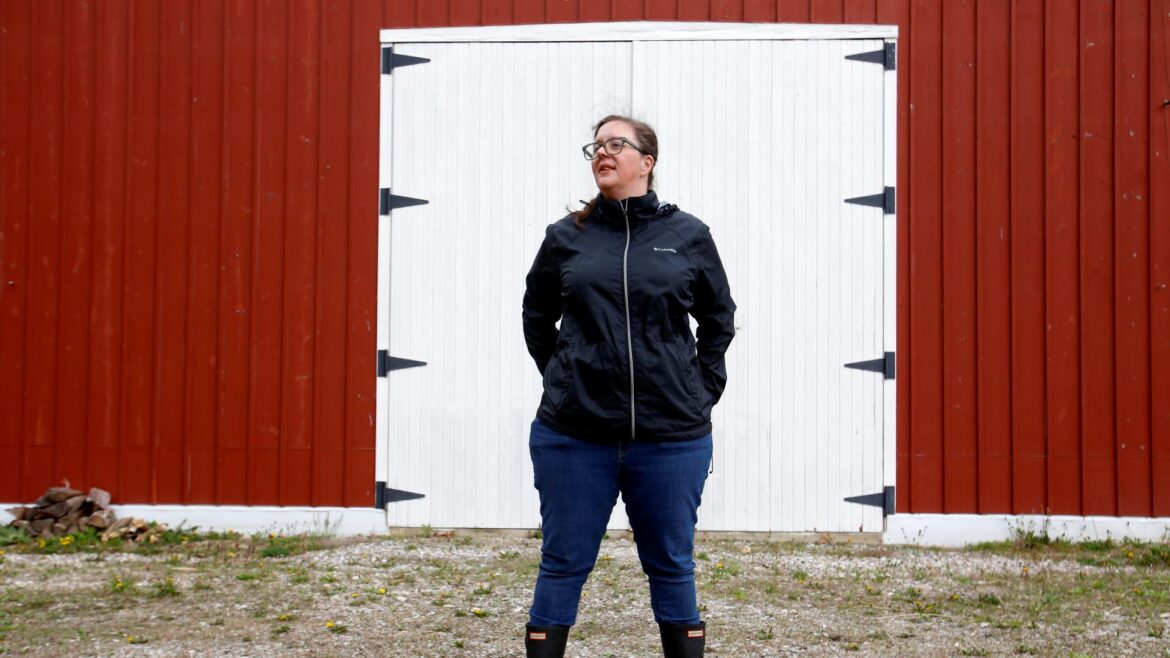 Alison Dreith stands in front of her barn in southern Illinois.