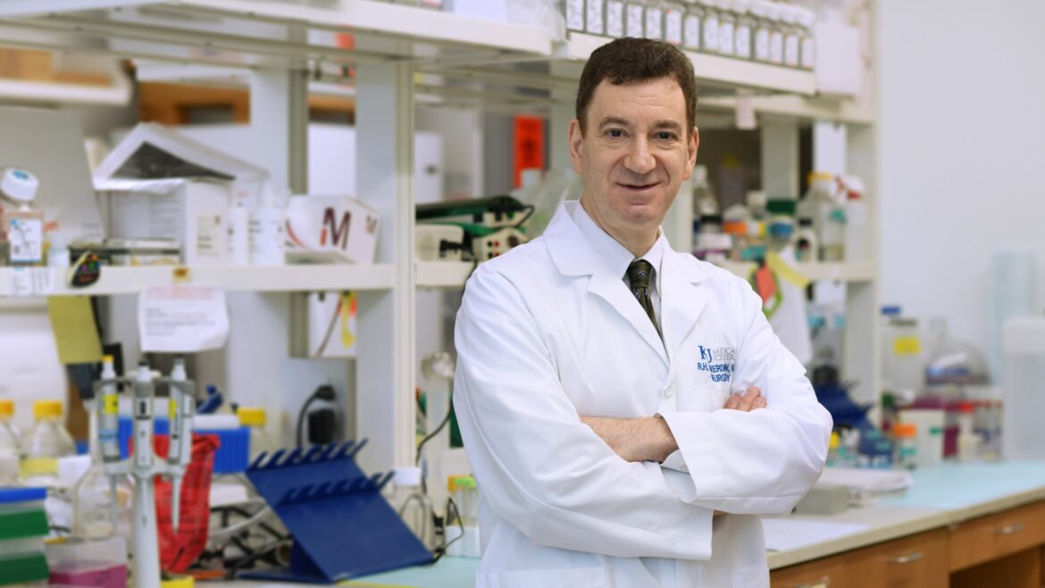 Dr. Russell Swerdlow, director of the Alzheimer’s Disease Research Center at the University of Kansas, in a laboratory setting.