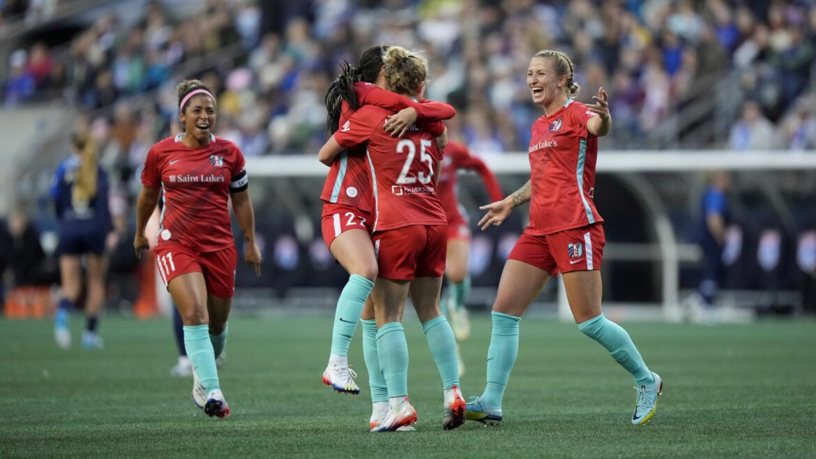 Kansas City Current players celebrate a goal.