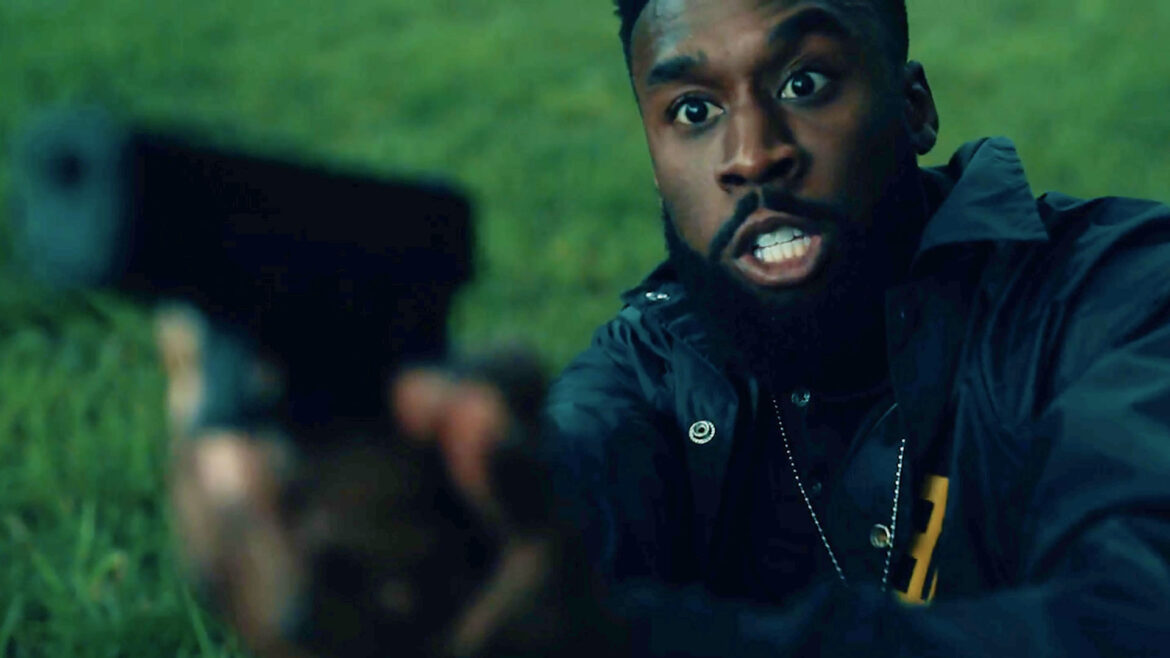 A man with a gun in a scene from "The Pulpit: Prelude.".