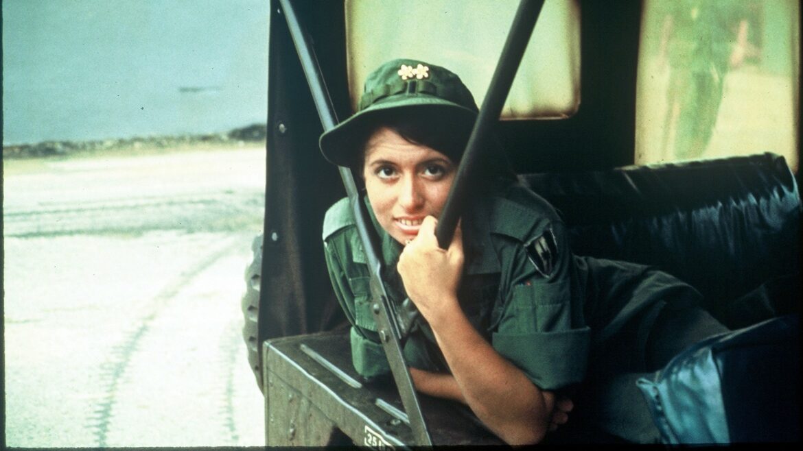 Louise Graul, a recent nursing school graduate, arrived in South Vietnam in 1969. In 2015 this photo appeared on the cover of her book -- writing as Lou Eisenbrandt -- “Vietnam Nurse: Mending & Remembering.”