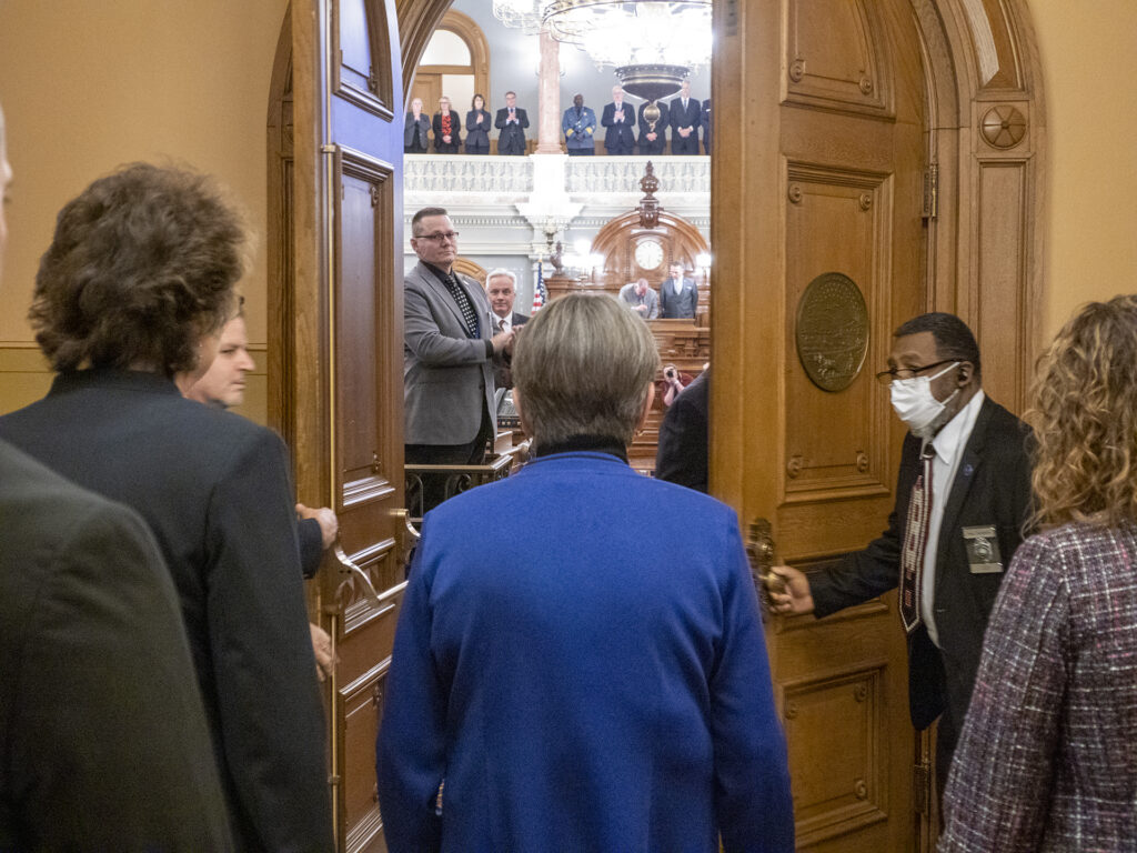 Kansas Gov. Laura Kelly enters to deliver the State of the State.