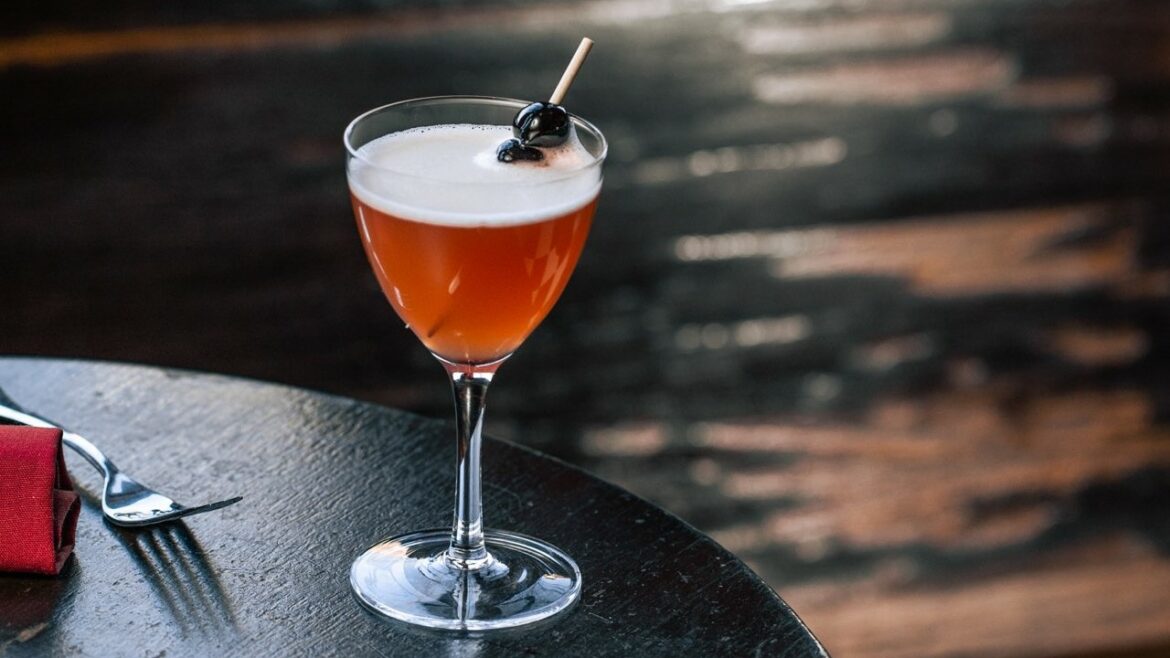 A craft cocktail on a table.