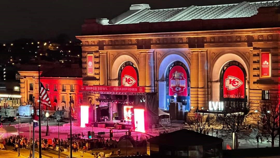 The Union Station stage lit up before dawn on the day of the Kansas City Chiefs Super Bowl championship parade.