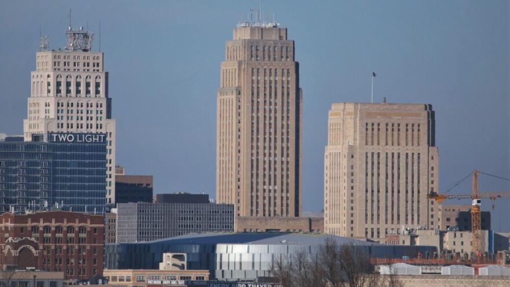 City Hall and the Jackson County Courthouse at the center of the downtown Kansas City skyline.