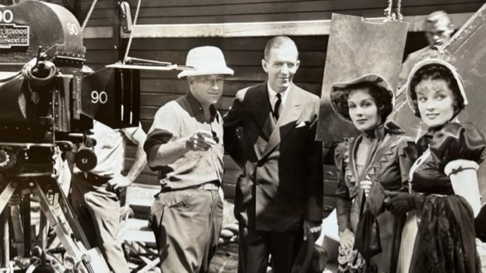 Landon Laird on the set of “The Buccaneer” with Cecil B. DeMille and, on right, Louise Campbell and Margot Grahame in 1937.