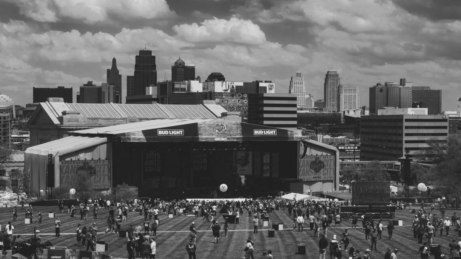 A crowd begins to gather in front of Union Station for the start of the NFL Draft.
