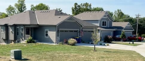 A row of large suburban looking townhomes