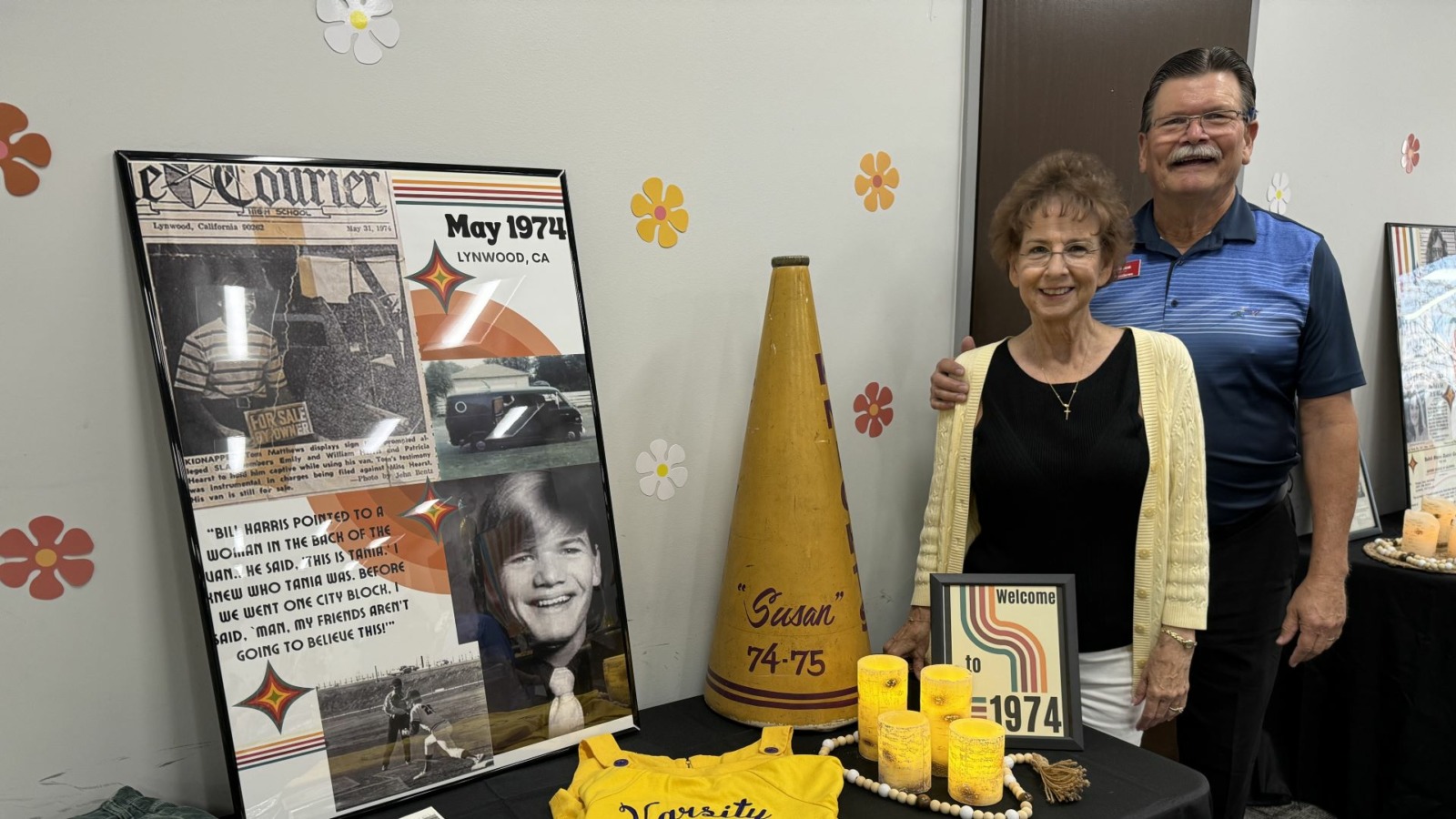 Tom and Susan Matthews stand next to memorabilia from 1974, when Tom was abducted by Patty Hurst and other members of the Symbionese Liberation Army.