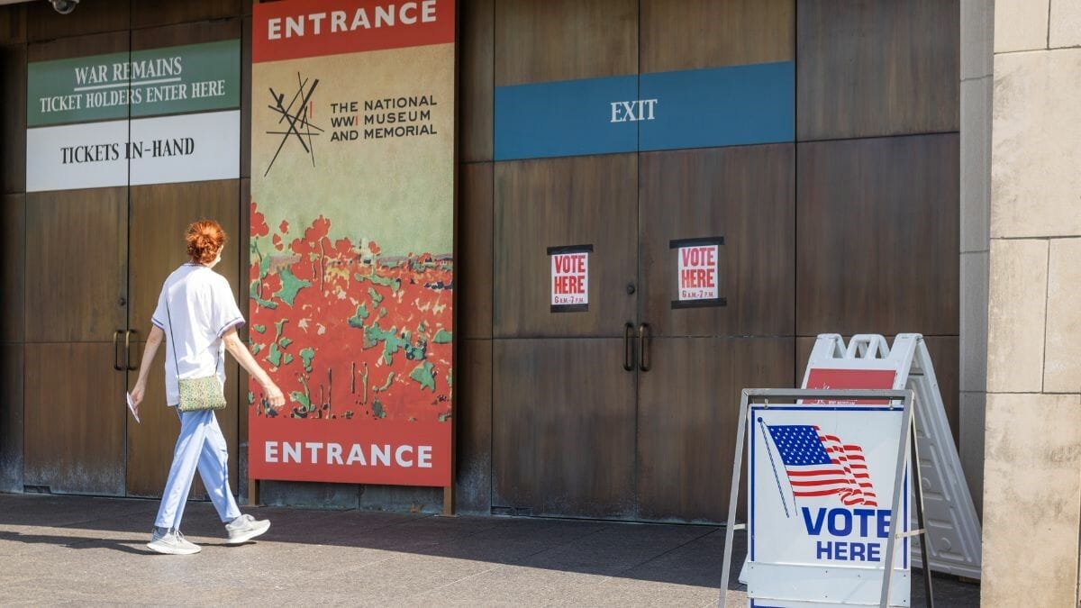 A voter enters a polling location at the National World War I Museum and Memorial to submit a ballot.
