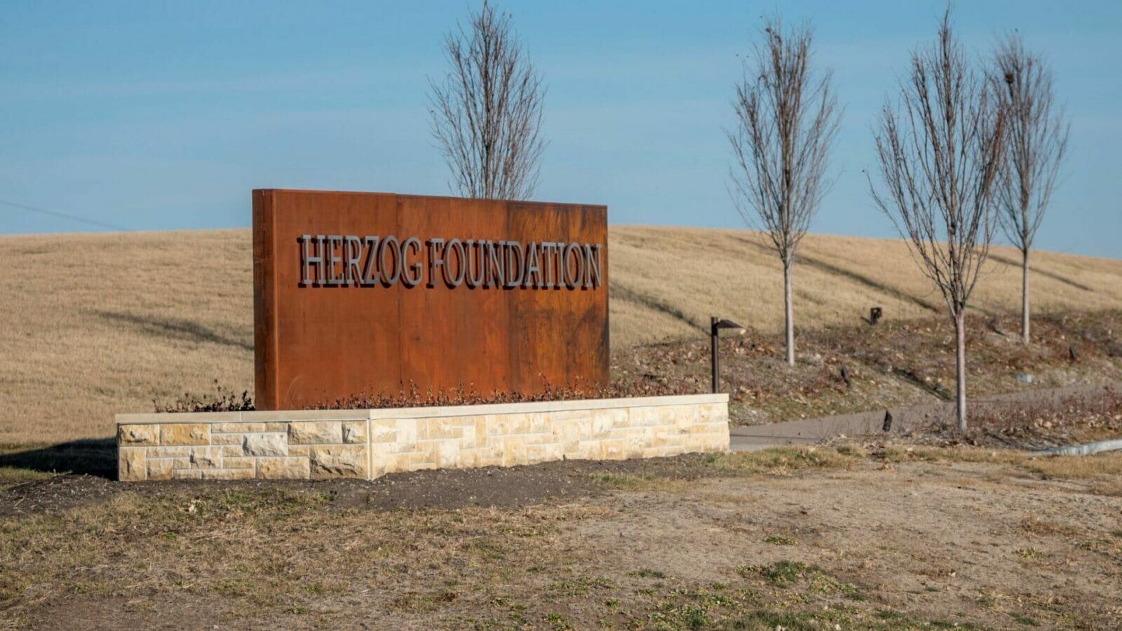 Monument sign for the Herzog Foundation in Smithville.