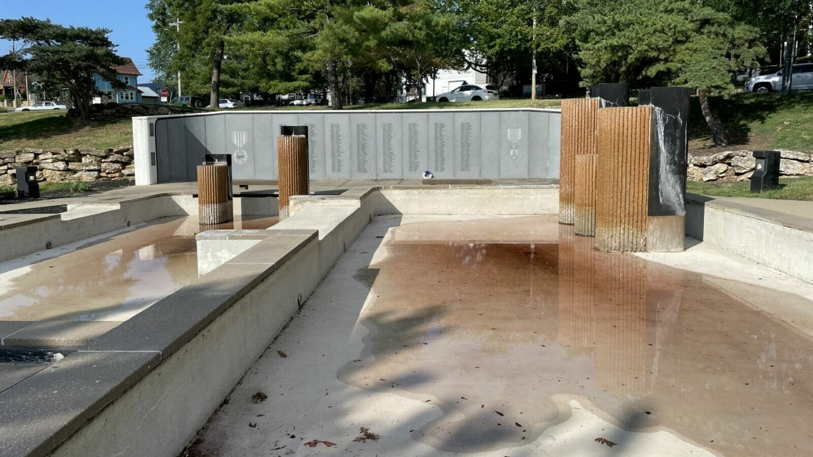 Fetid rainwater collected in the Kansas City Vietnam Veterans Memorial Fountain after a water pump failed.