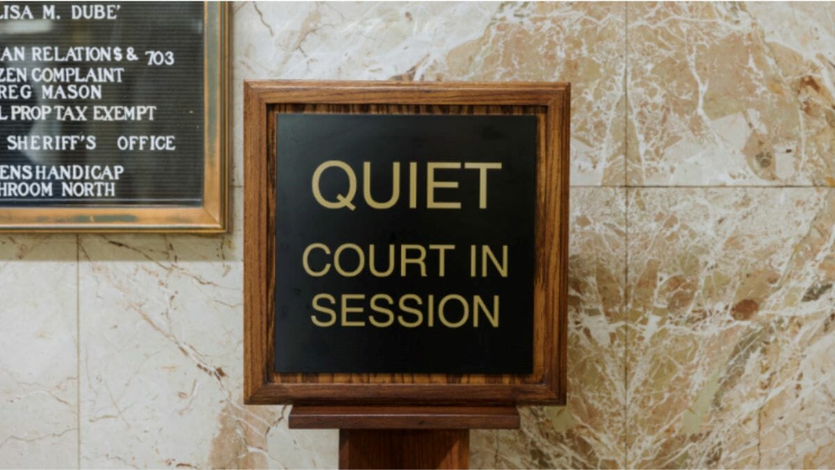 A "Quiet Court in Session" sign.