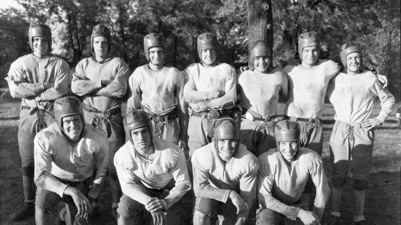 By the mid-1930s Kansas City area high school football players, like these members of the William Chrisman High School football squad in Independence, competed while wearing helmets and protective padded apparel.