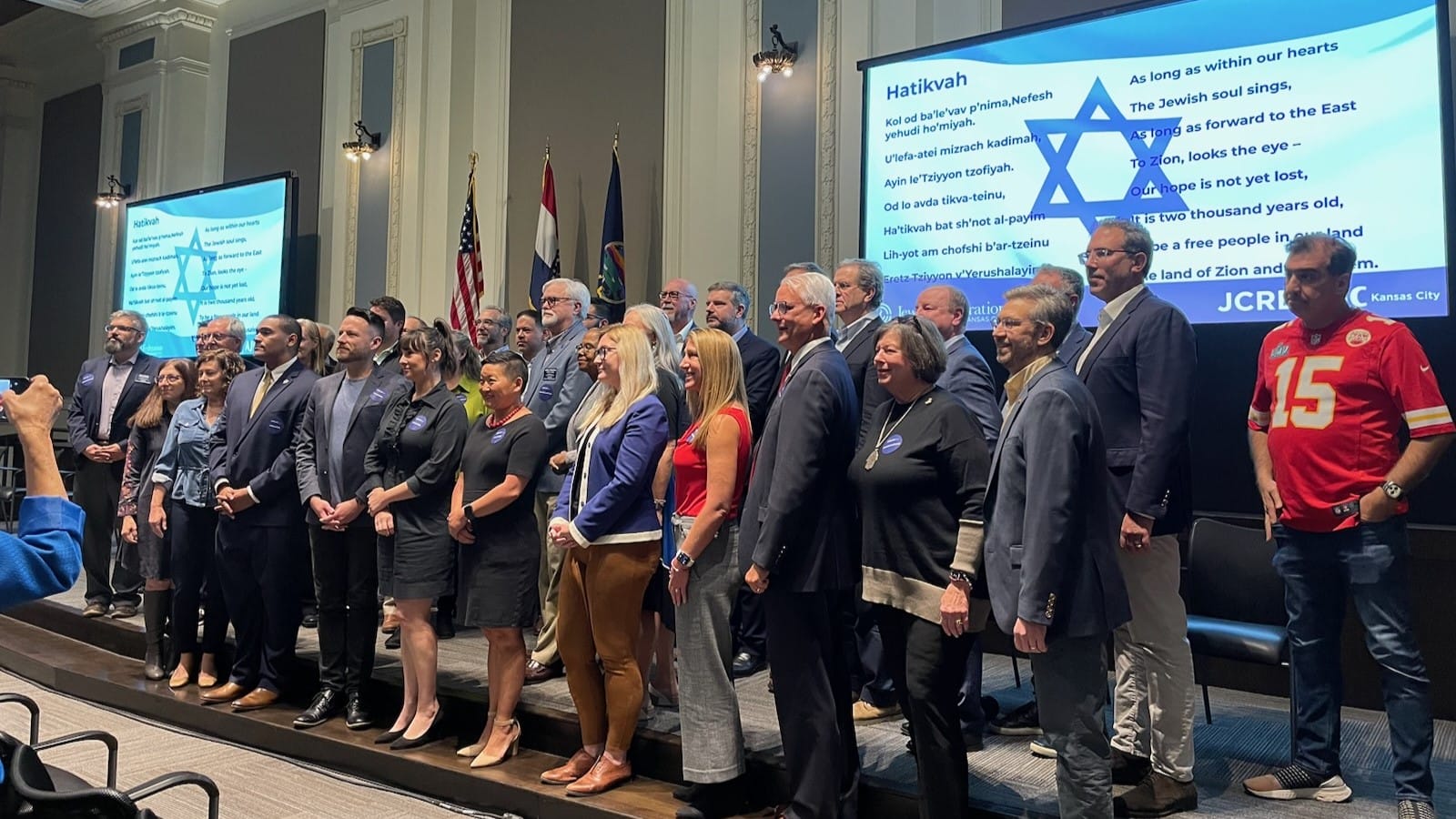 Local elected and civic officials stood for photos at the conclusion of an update on Israel held in the boardroom of the Greater Kansas City Chamber of Commerce.