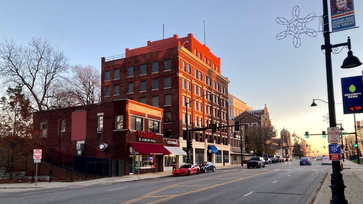 A line of red-brick buildings down 7th Street from the Unified Government City Hall and Wyandotte County Courthouse.