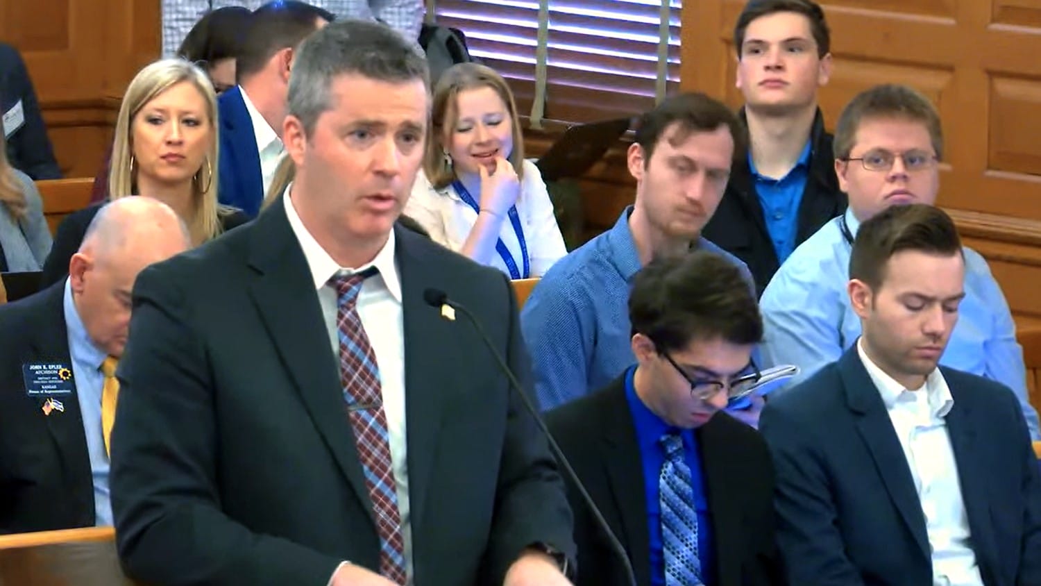 Kansas Budget Director Adam Proffitt addresses a joint hearing of Senate and House lawmakers Thursday to reveal the governor’s budget plan.