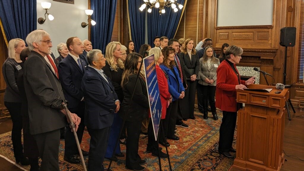 Gov. Laura Kelly and a bipartisan group of legislators propose a property, sales and income tax reduction bill on the first day of the 2024 session.