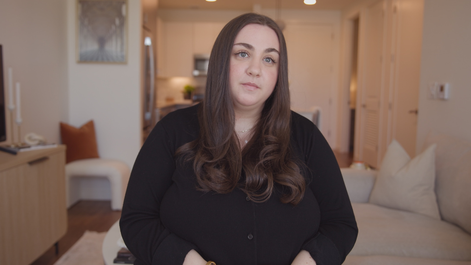 Woman in a black shirt.