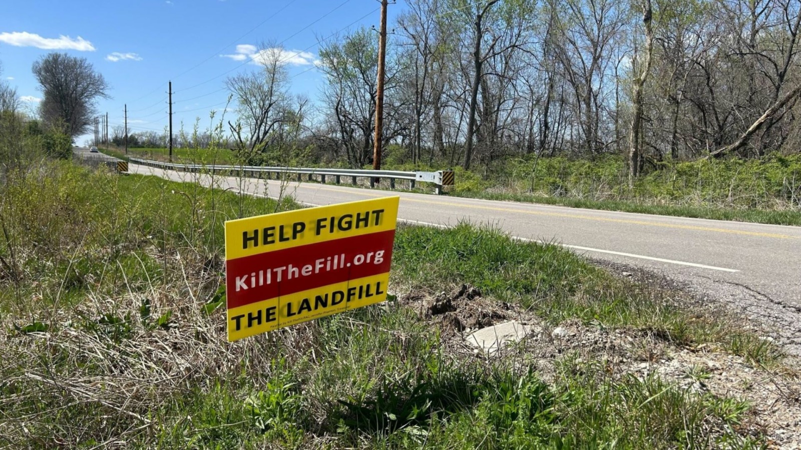 A sign across from the proposed landfill in south Kansas City implores drivers to help stop the project from moving forward.