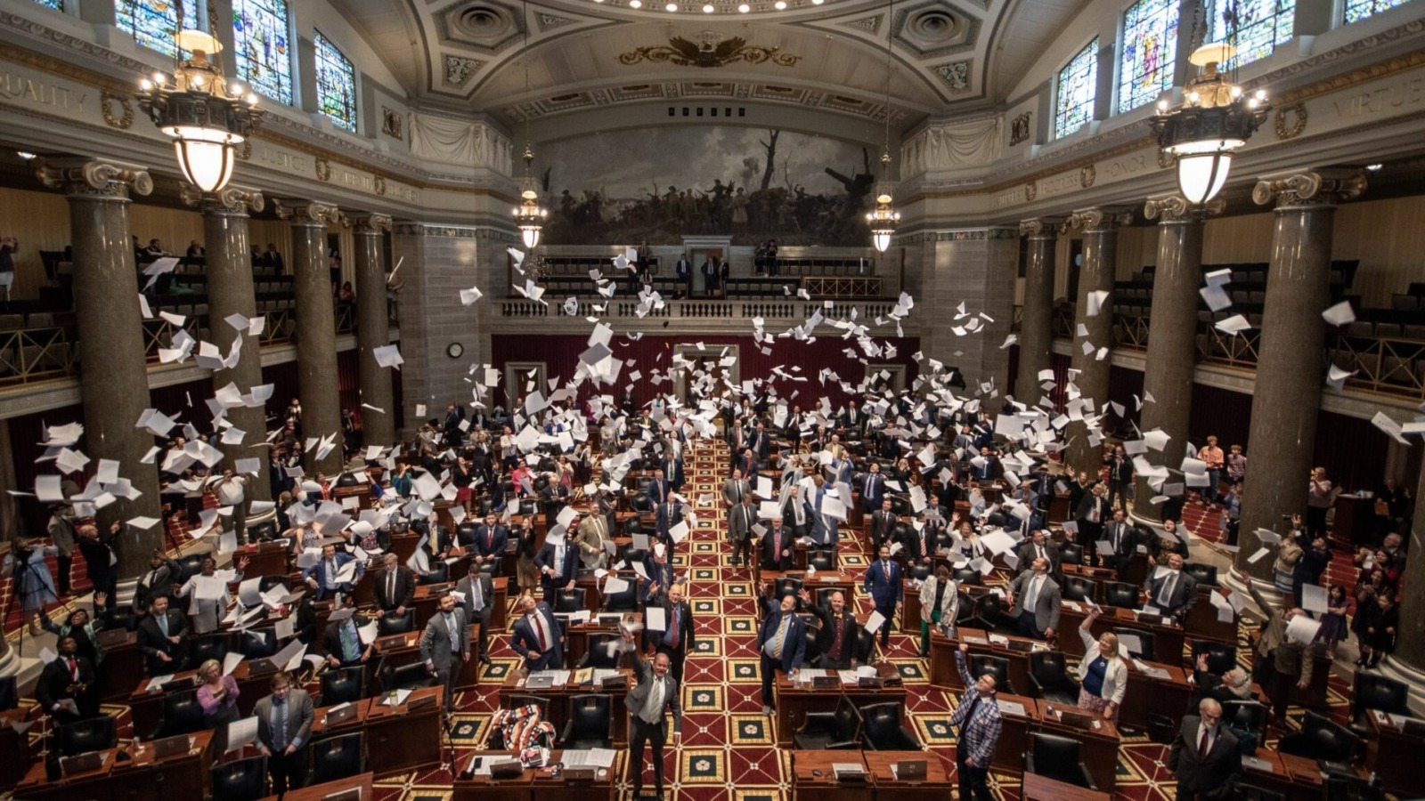 The Missouri House of Representatives commemorates the end of the 2024 legislative session by tossing hard copies of bills into the air upon adjournment.