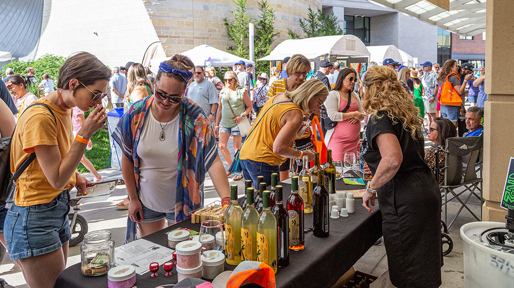 People tasting wine at the Lenexa Art Fair.