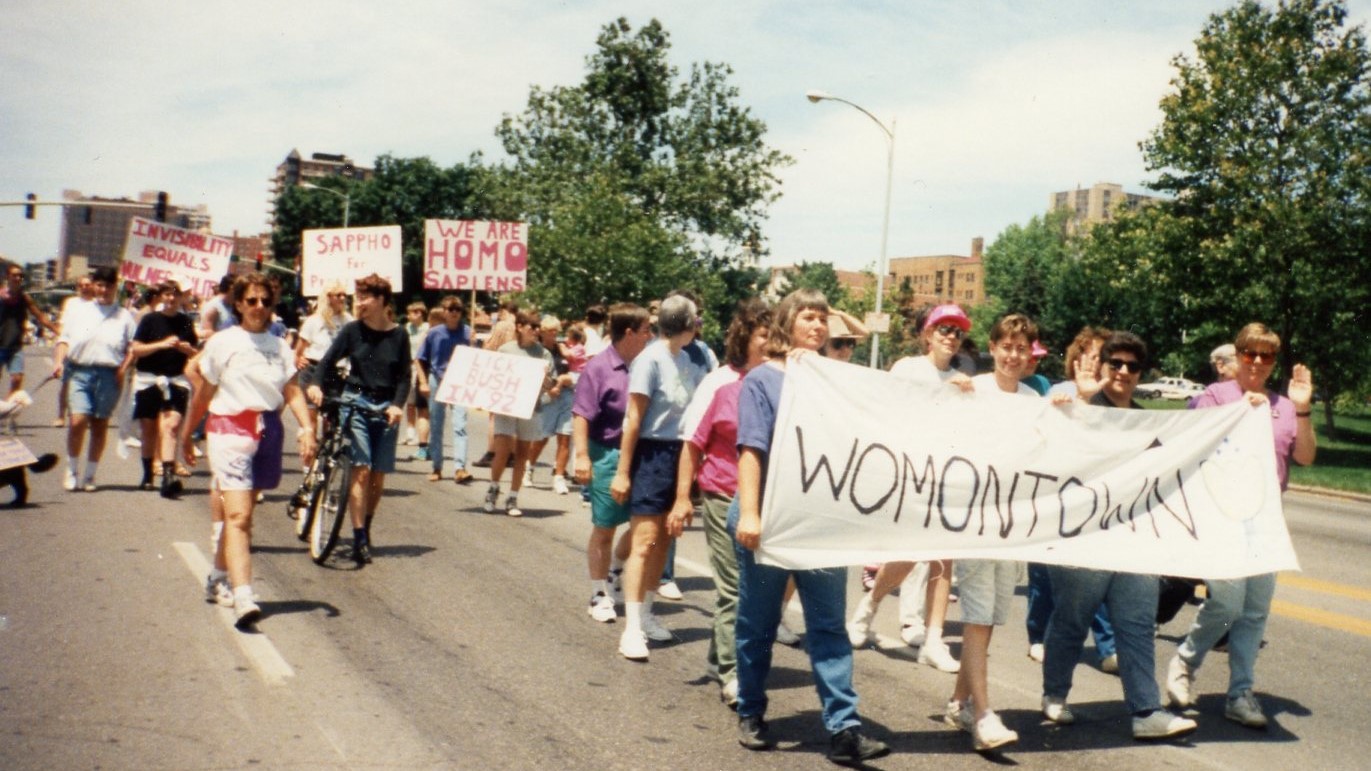 The womyn of the newly formed Womontown march in the 1989 Kansas City Pride Parade.