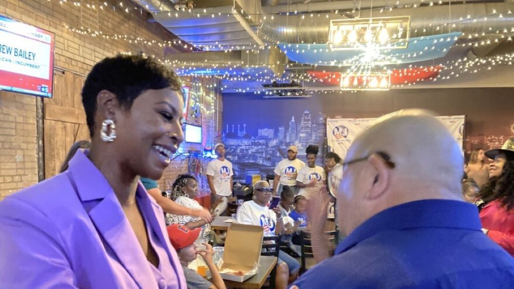 Melesa Johnson greets a supporter.