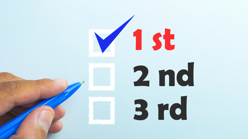 Ranking box graphic with hand writing over a blue background.