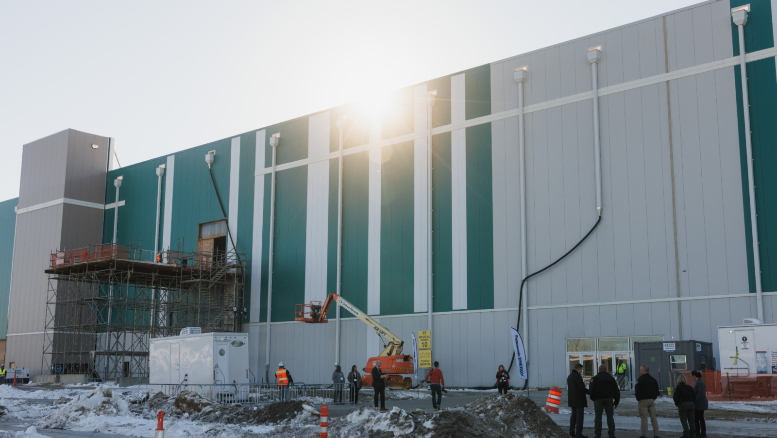 Morning sun peeks over the roof of the Panasonic EV Battery Facility in DeSoto, Kansas, on Jan. 17, 2025. (Chase Castor | Flatland)
