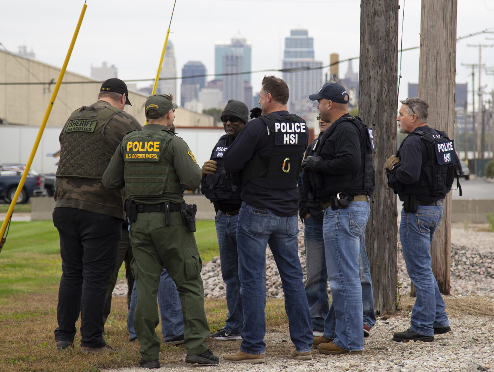 Members of the U.S. Immigration and Customs Enforcement Border Enforcement Security Task Force in Kansas City confer. (Ron Rogers | U.S. Immigration and Customs Enforcement)