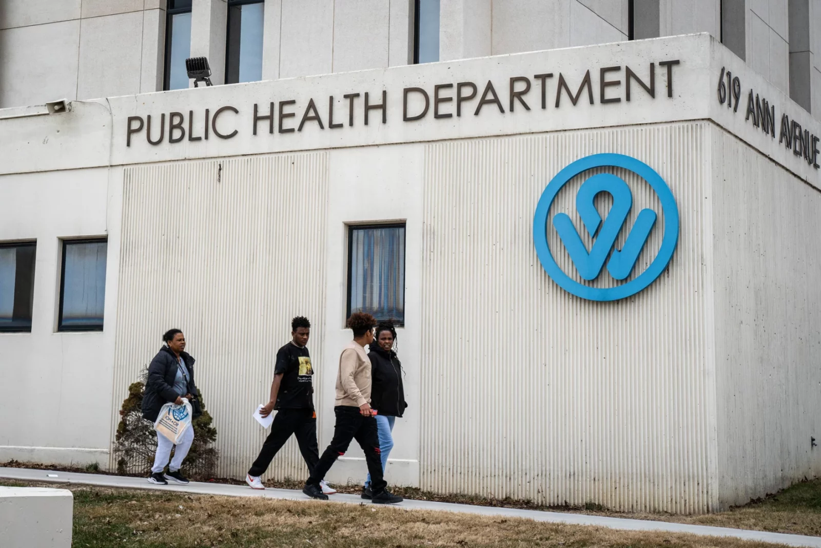 People walk outside the Wyandotte County Public Health Department in Kansas City, Kansas. (Zane Irwin | Kansas News Service