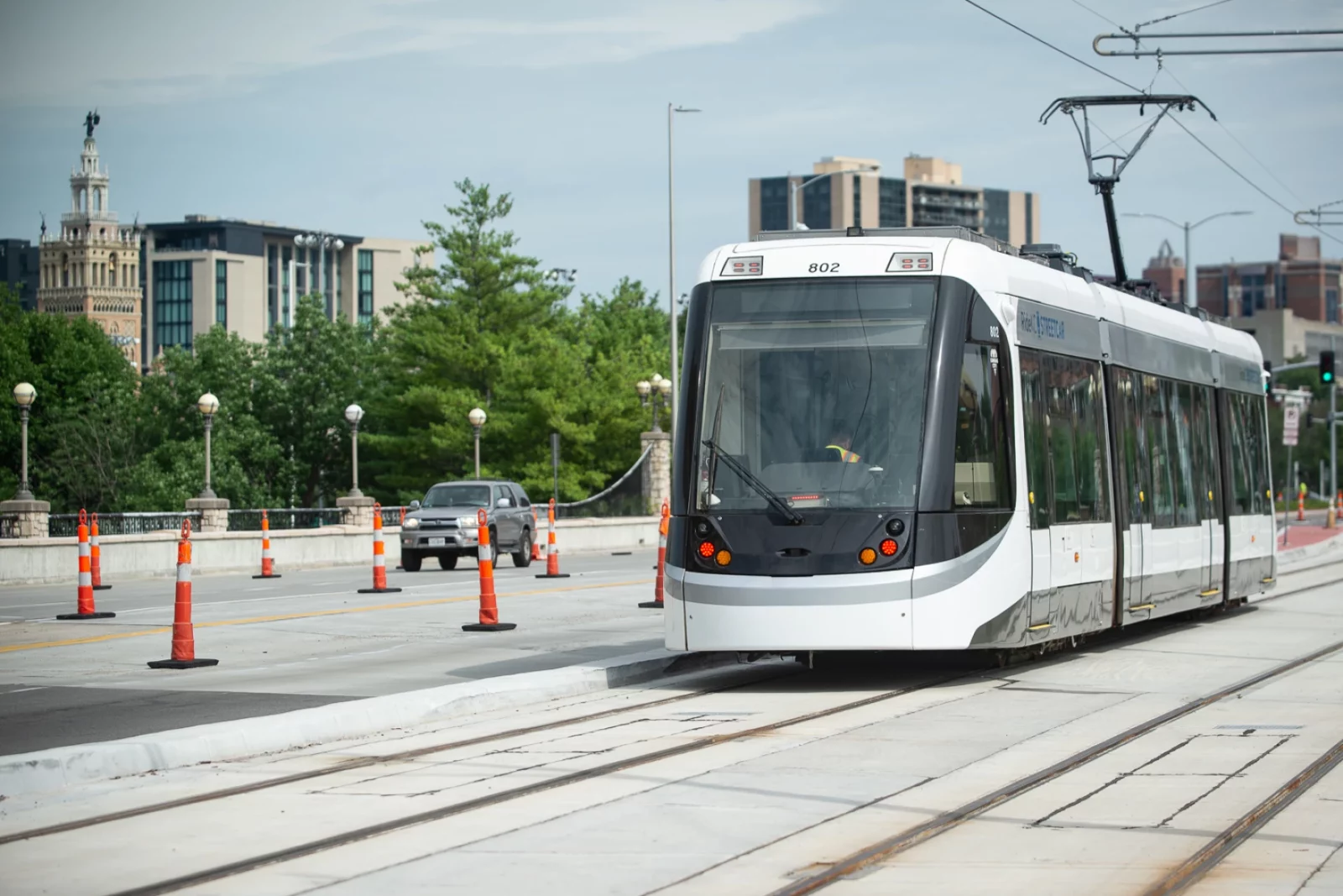 Streetcar 802 sits idle on Main Street near Country Club Plaza where it was undergoing testing on the Main Street extension on Thursday, July 24, 2025. (Carlos Moreno | KCUR 89.3)