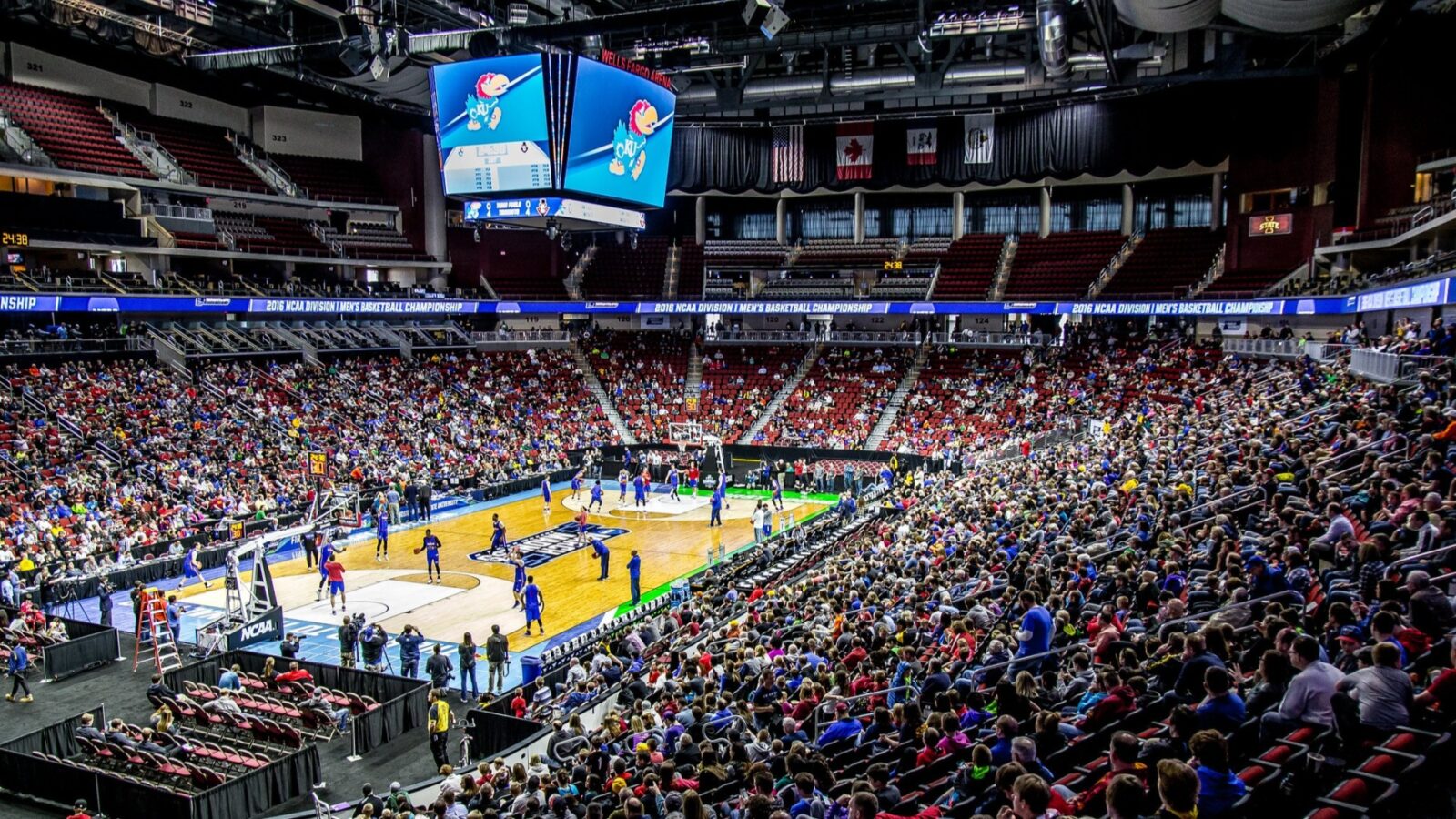 A basketball arena filled with fans.