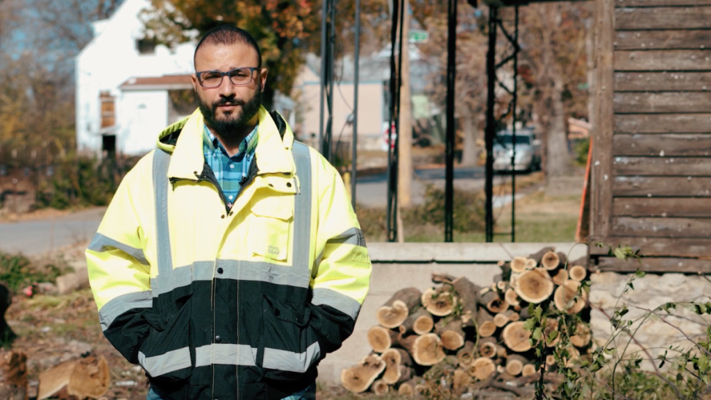 Reda Ibrahim in front of a worksite where he is building an affordable, energy-efficient home in Kansas City’s Lykins neighborhood. (Courtesy of Mercy in the City)