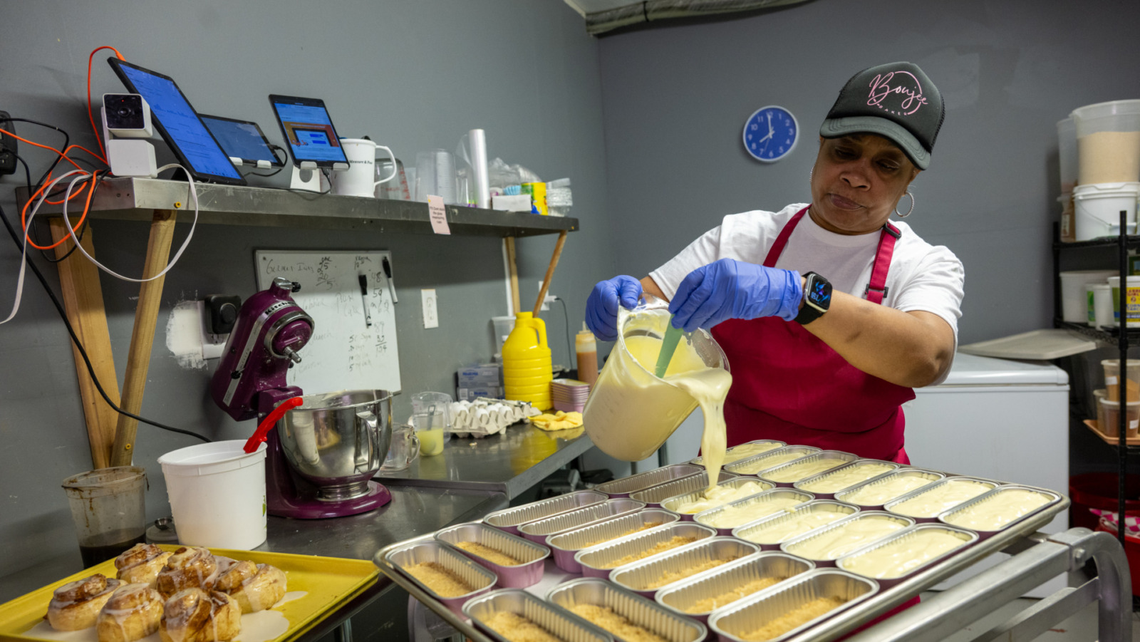 Boujee Baker owner Joyce Watts prepares cheesecakes early in the morning at her establishment on 2311 E. 12th St in Kansas City, Missouri. Flavors include salted caramel, Oreo, lemon, and sweet potato. (Todd Feeback | Flatland)