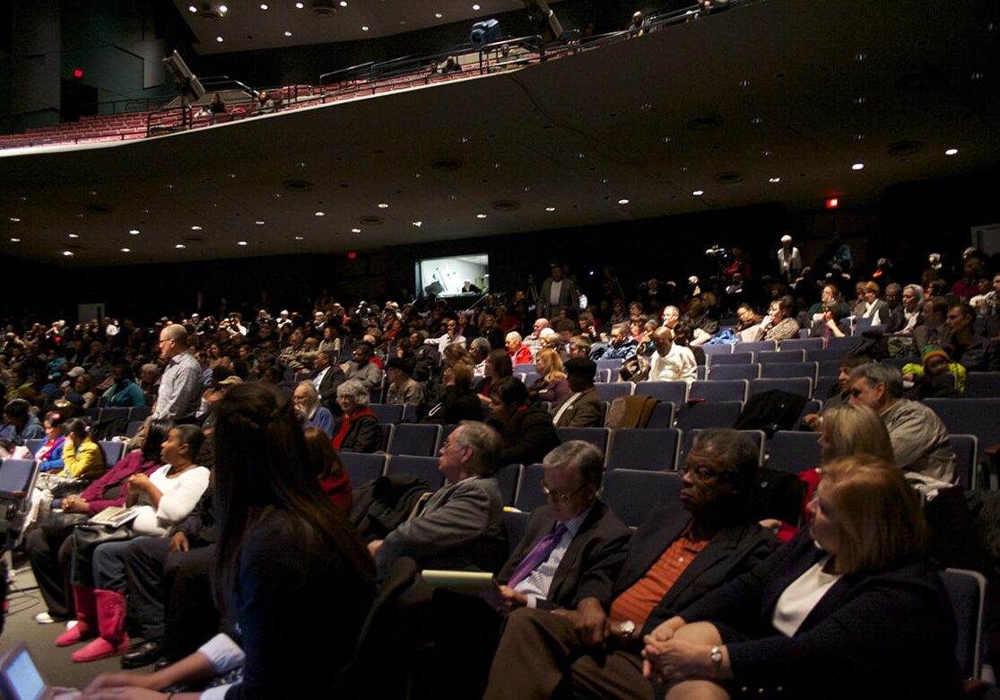 wide shot of crowd in an auditorium