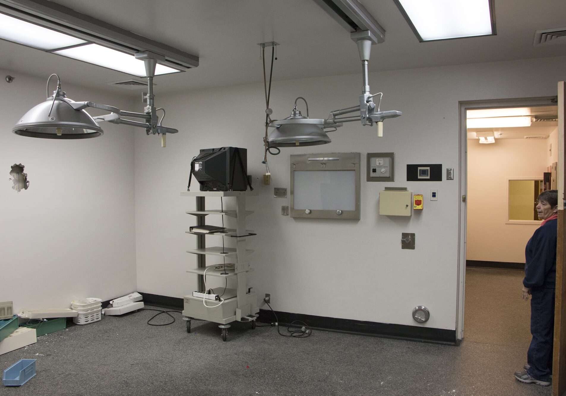 Connie Chapman, who worked at the Sac-Osage Hospital in Osceola, Missouri for 40 years, looks over a nearly empty room in the hospital that is slated for demolition sometime this spring. (Photo by Todd Feeback/Flatland)